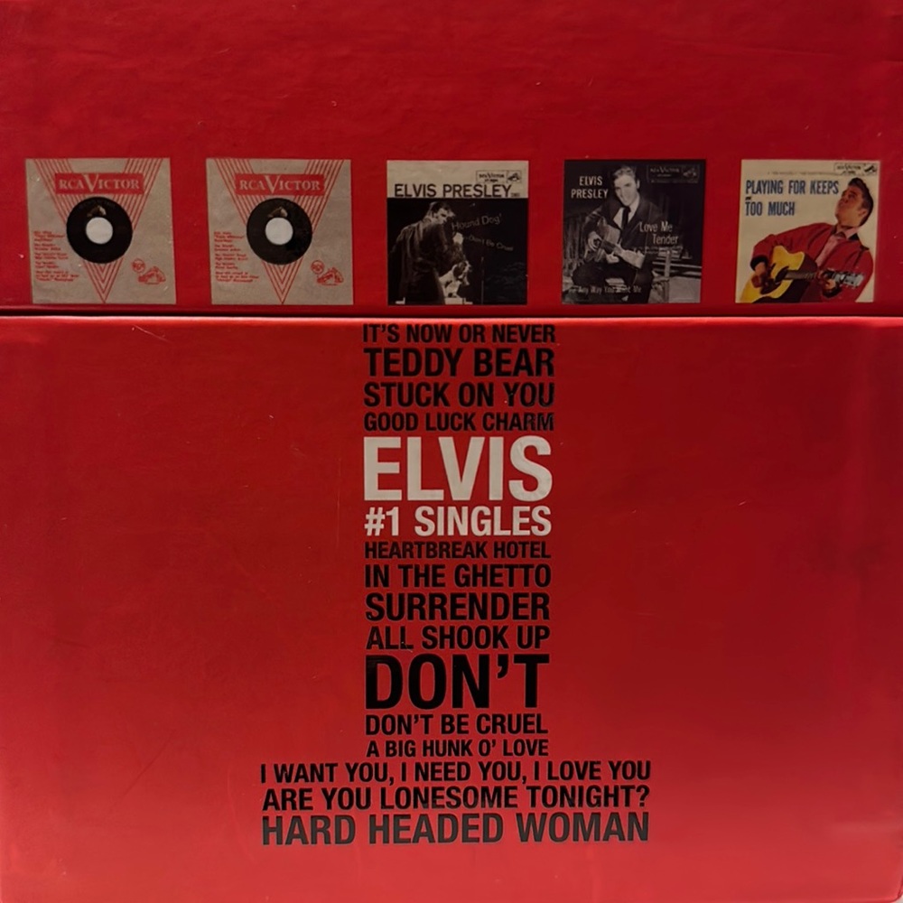 Elvis Presley, NWOT Elvis Presley’s Box of #1 hits on 20 45 RPM Vinyl Records.